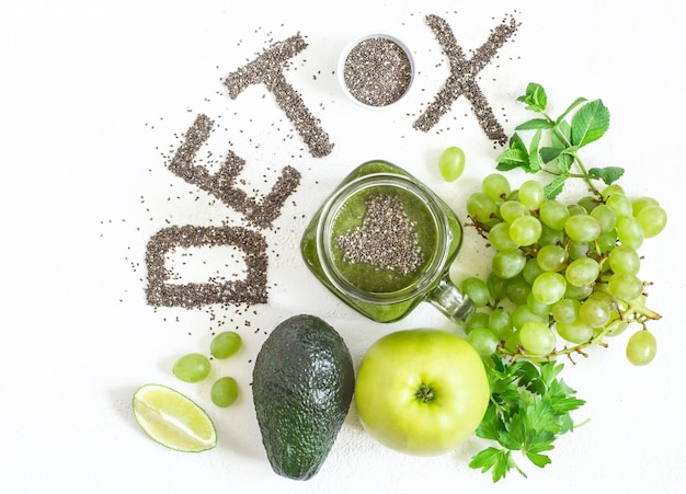 Word detox is made from chia seeds Green smoothies and ingredients Concept of diet cleansing the body healthy eating