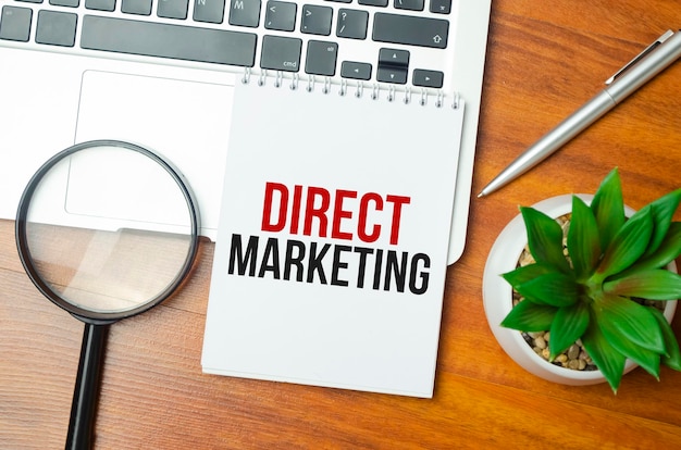 The word direct deposit is written in a notebook Business text