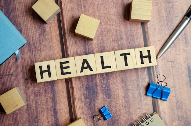 Photo word health made with wooden blocks and pen