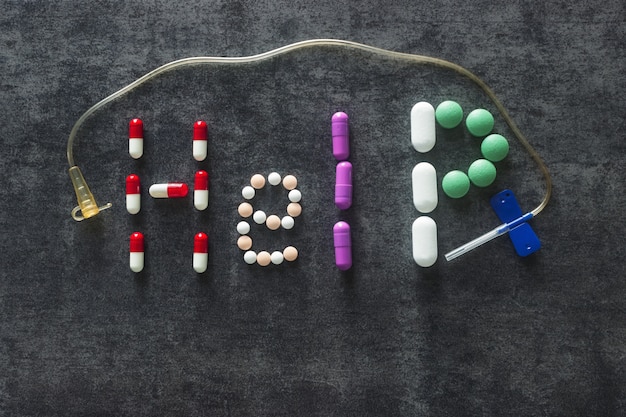 The word Help made out of colorful pills