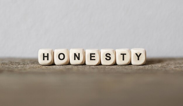 Word HONESTY made with wood building blocks