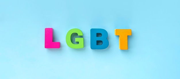 Word lgbt in single letters on a blue background