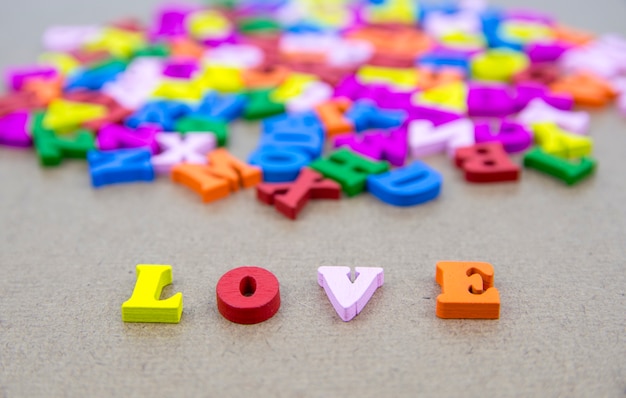 Word of LOVE on the background with colorful alphabet