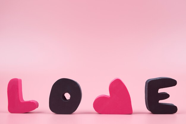 Word Love, on a pink background. Valentines day