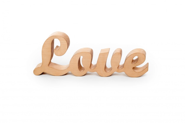 the word love in wooden letters on white background