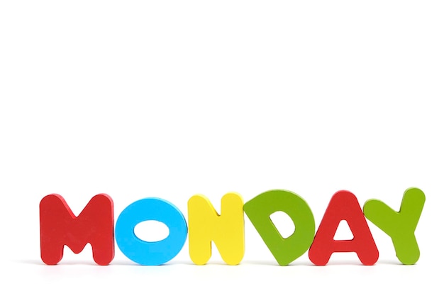 Word monday composed multi colored letters white background