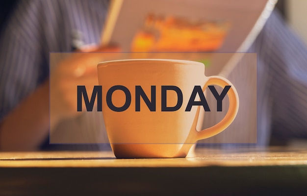 Word monday with coffee cup planner as happy summer week beginning