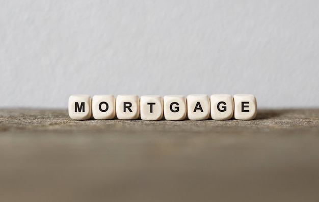 Word MORTGAGE made with wood building blocks