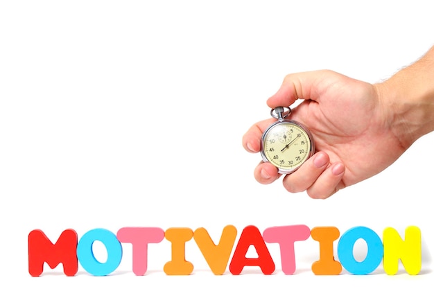 Word motivation and stopwatch in your hand white background