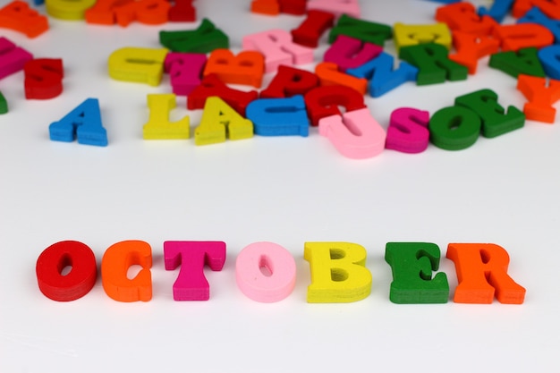 The word october with colored letters