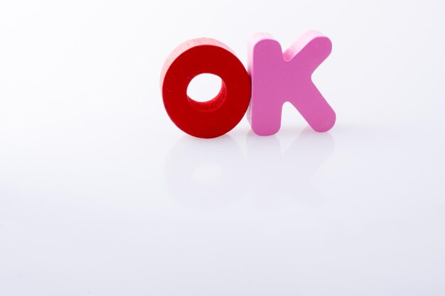 The word OK written with letter blocks