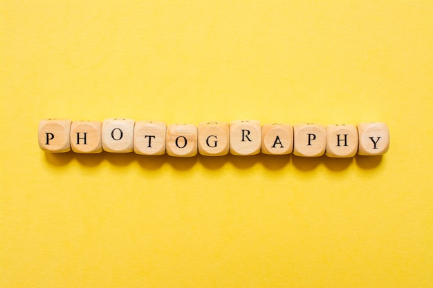 The word Photography, text made with dice