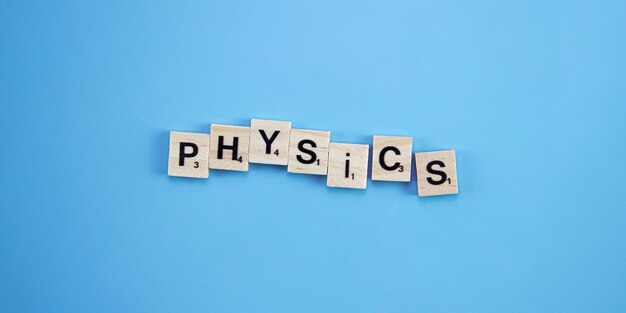 The word physics spelt with wooden letters