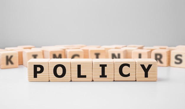 Word POLICY made with wood building blocks