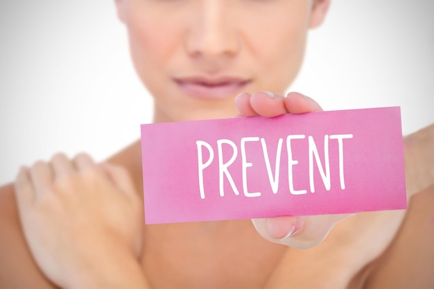 Photo the word prevent and young woman holding blank card against white background with vignette