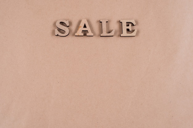 Word sale abstract wooden letters