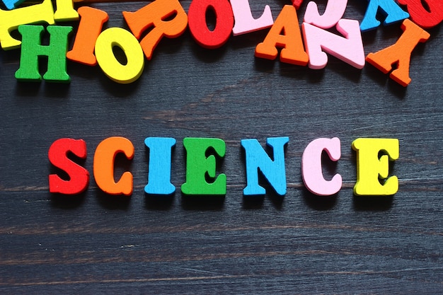 The word science with colored letters