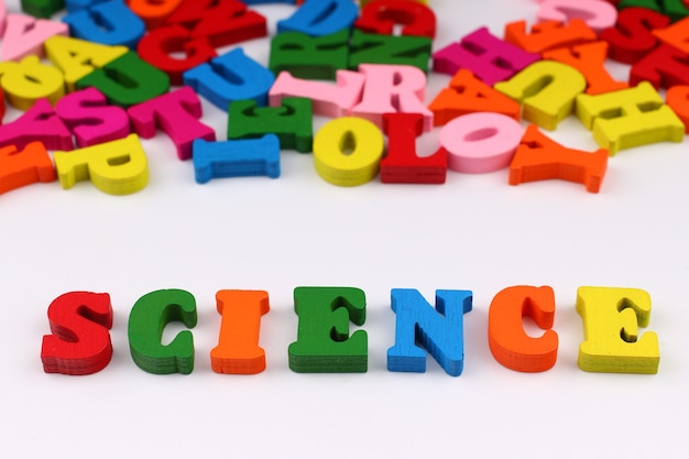 The word science with colored letters