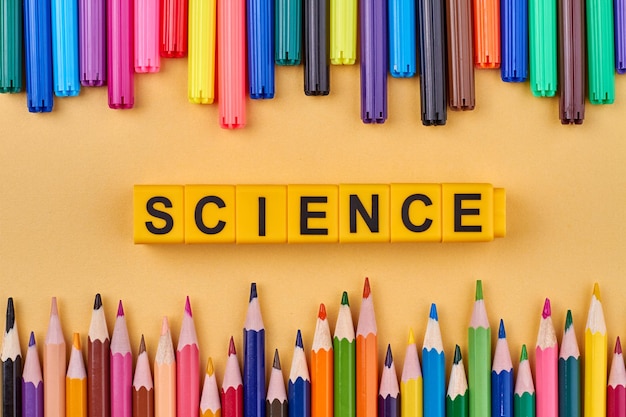 The word science written on yellow cubes