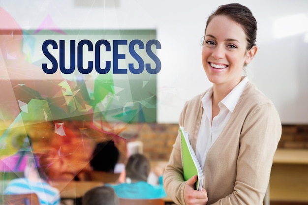 Photo the word success against pretty teacher smiling at camera at back of classroom