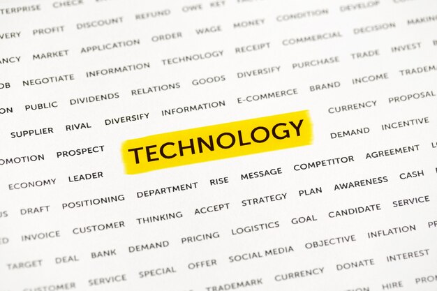 The word "Technology" is highlighted with a marker on paper