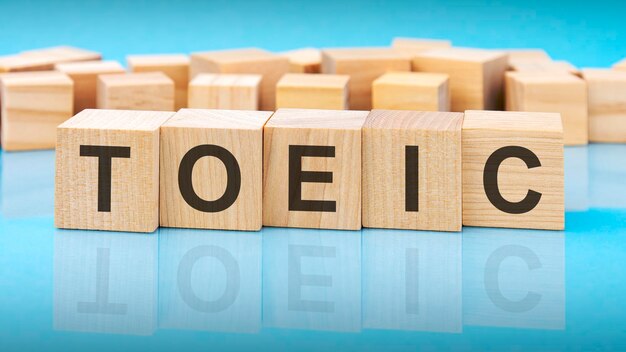 Word toeic made with wood building blocks business concept