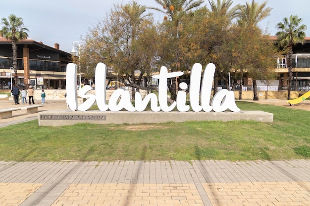 The word in white Islantilla, a coastal town full of tourist resorts, Lepe, Huelva, Spain.