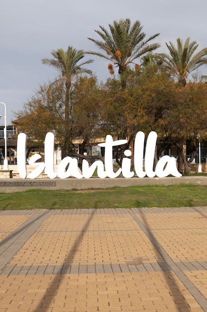 The word in white Islantilla, a coastal town full of tourist resorts, Lepe, Huelva, Spain.