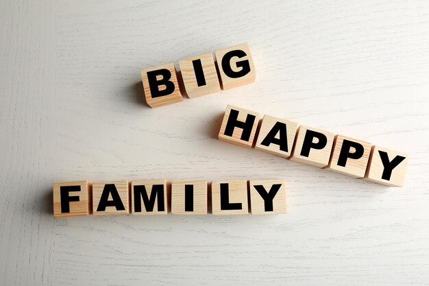 Words BIG HAPPY FAMILY on light background