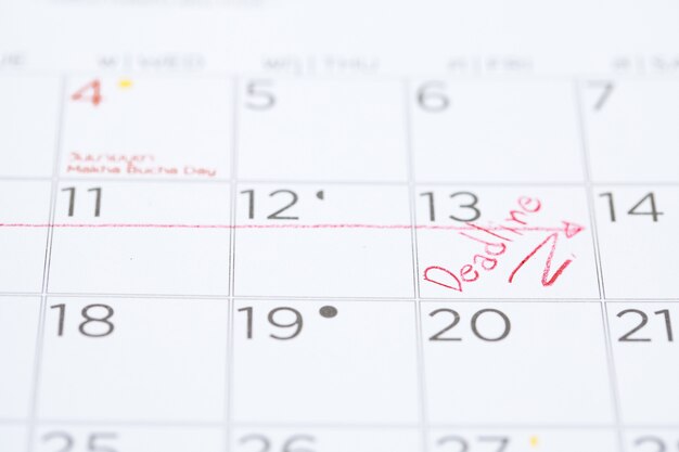 The words Deadline written on a Calendar