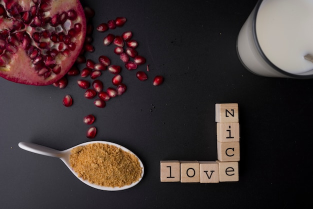 Words nice and love, with the preparations of breakfast, milk, sugar and pomegranate