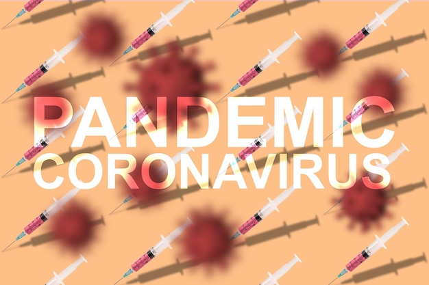 写真 パンデミック・コロナウイルス (pandemic coronavirus) という言葉はクリエイティブなパターン注射器医療用黄色い背景covid-19 (covid-19) に描かれています