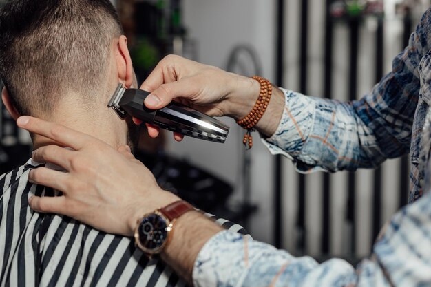 Work in the barber shop man hairstylist