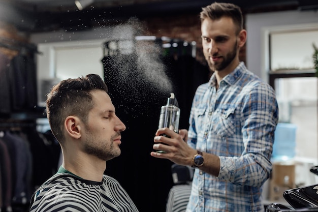 Work in the barber shop man hairstylist