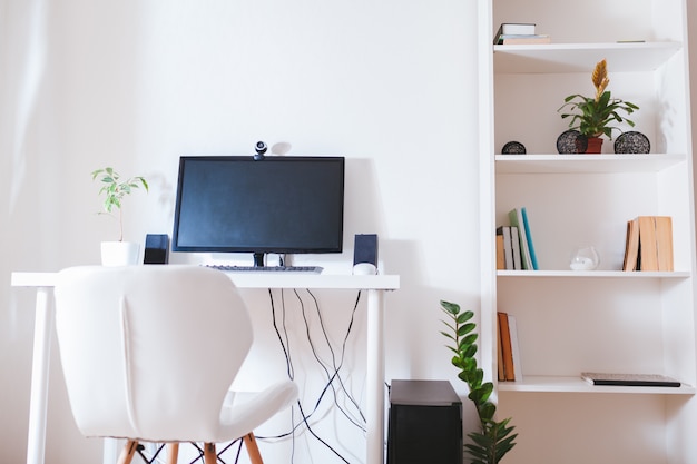 Photo work from home during coromavirus pandemic. stay home. workspace of freelancer. office interior with computer