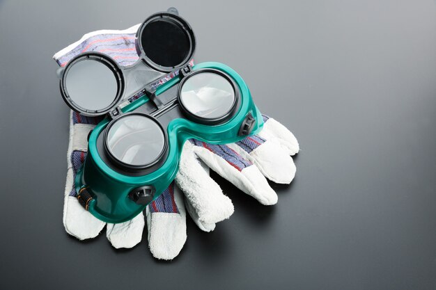 Work gloves and protective glasses