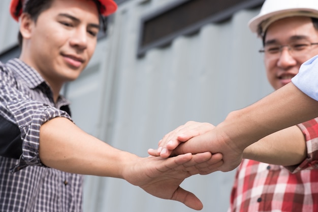 Photo work group of engineer people joining hands