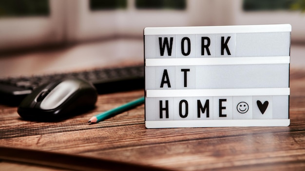 Work at home inscription on the desk