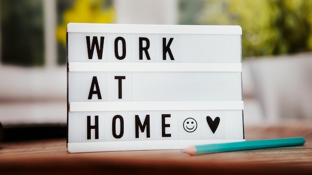 Work at home inscription on the desk