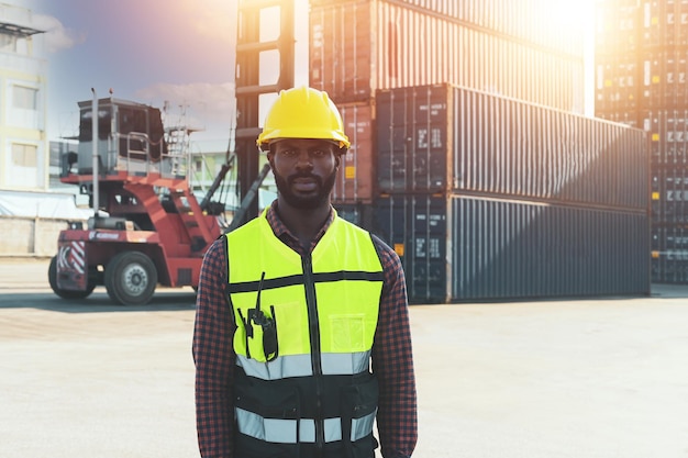 Worker African american in container loading station import export large cargo shipment