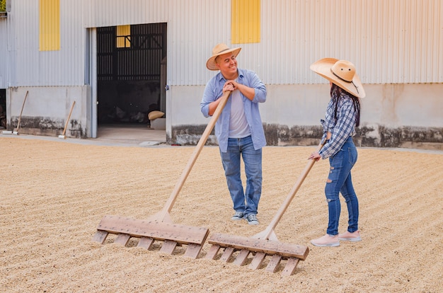 worker couple moving coffee