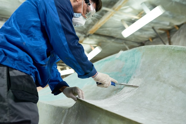 Worker Doing Boat Repairs