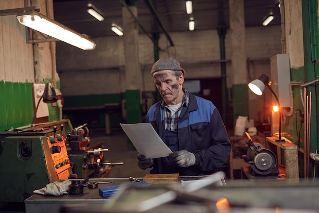 Photo worker examining the contract