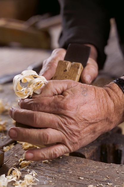 Worker handles a wooden board