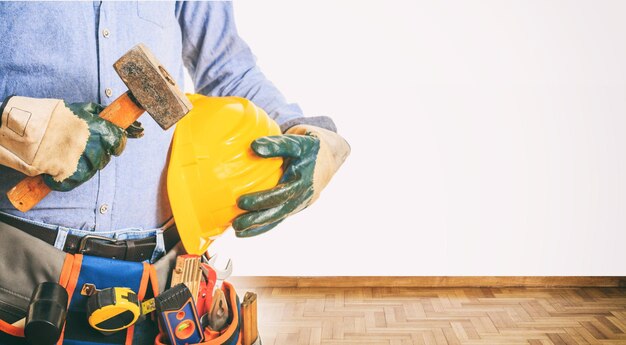 Worker holding a hammer