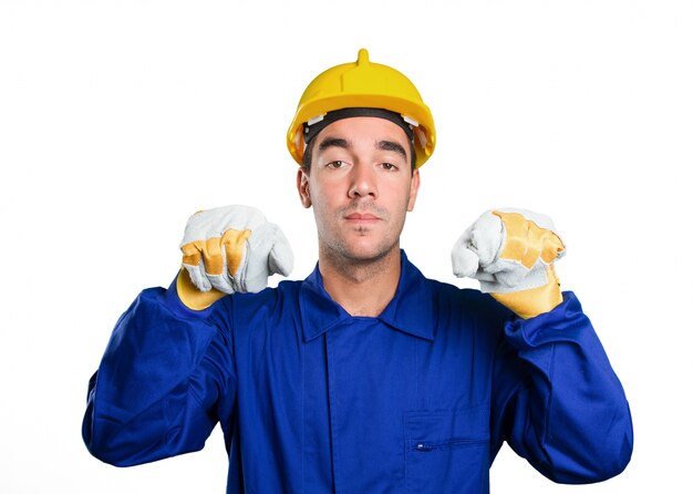 Photo worker holding an imaginary poster on white background