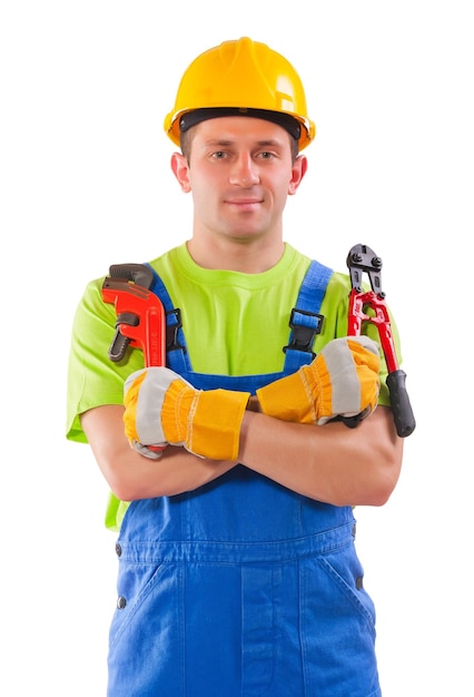 Worker holding pipe wrench and steel cutter