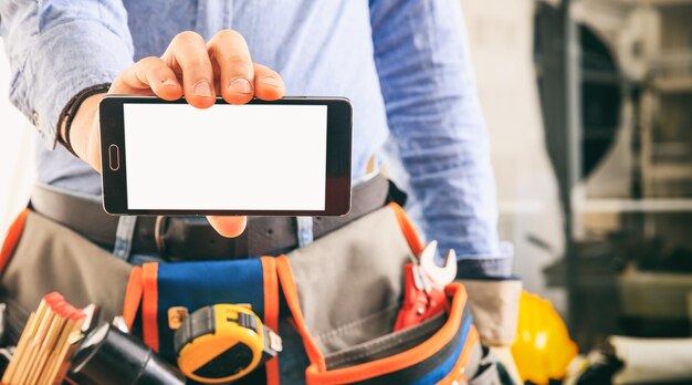 Worker holding a smartphone