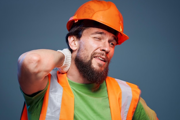 Worker man Construction uniform emotions engineer professional blue background High quality photo