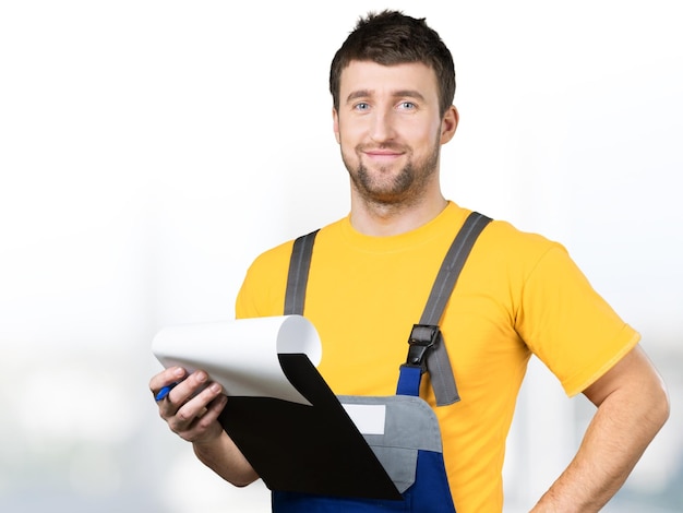 Worker man holding in hand folder